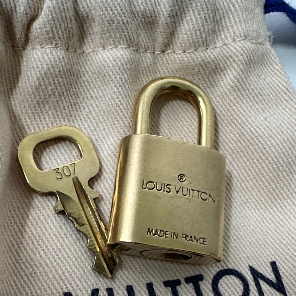 Authentic Louis Vuitton Lock and Key with Dust Bag. # 307